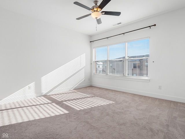 2578 Filson St, Carmel, IN 46032 - empty room with baseboards, carpet, a ceiling fan, and visible vents