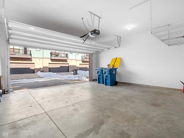 2578 Filson St, Carmel, IN 46032 - garage featuring baseboards and a garage door opener