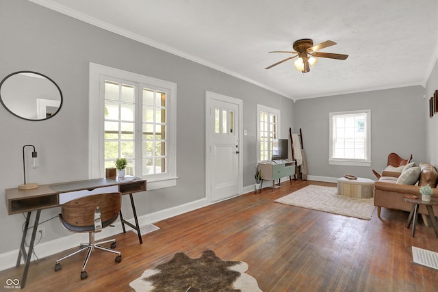 112 S Spencer Ave, Indianapolis, IN 46219 - living area with ornamental molding, visible vents, a ceiling fan, and hardwood / wood-style flooring