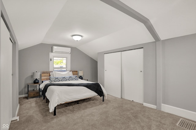112 S Spencer Ave, Indianapolis, IN 46219 - bedroom featuring vaulted ceiling, an AC wall unit, carpet floors, visible vents, and a closet