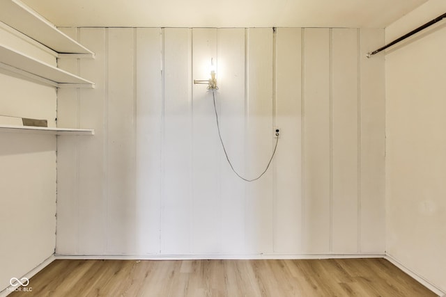 7906 E 21st St, Indianapolis, IN 46219 - spacious closet with light wood finished floors