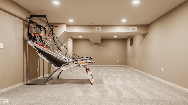 unfurnished room with recessed lighting, carpet, baseboards, and visible vents