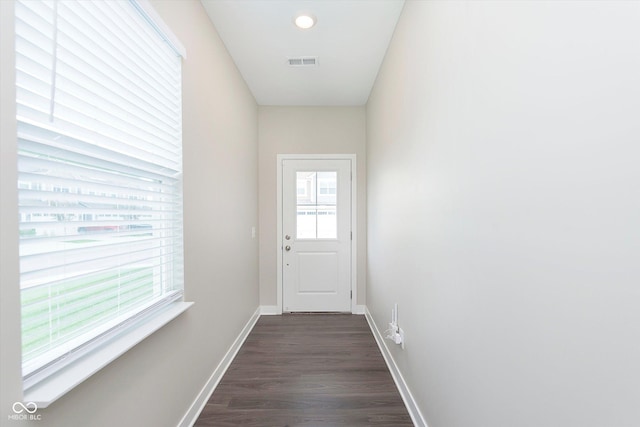 1239 Newton St, Avon, IN 46123 - doorway with baseboards, visible vents, and dark wood-style floors