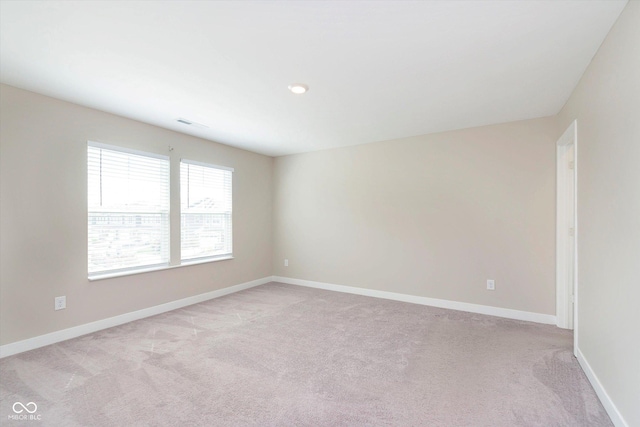 1239 Newton St, Avon, IN 46123 - empty room with baseboards and light colored carpet