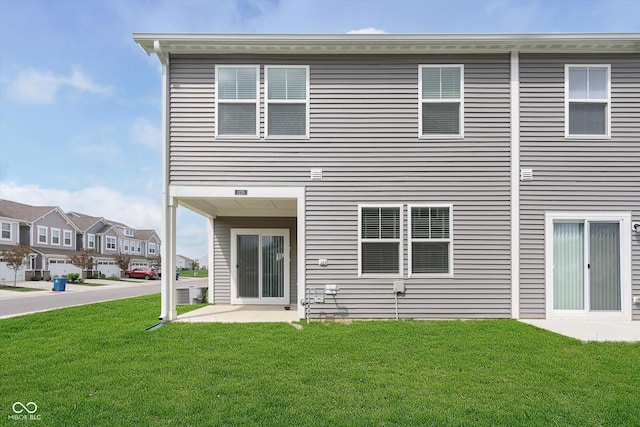 1239 Newton St, Avon, IN 46123 - back of house with a yard, a residential view, and a patio area