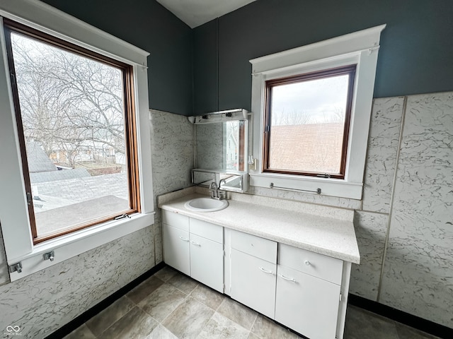 bathroom featuring vanity and plenty of natural light