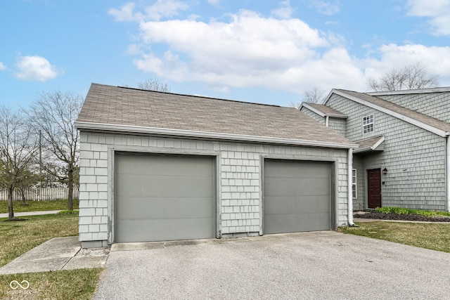 garage featuring fence
