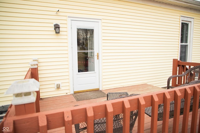 doorway to property with a deck