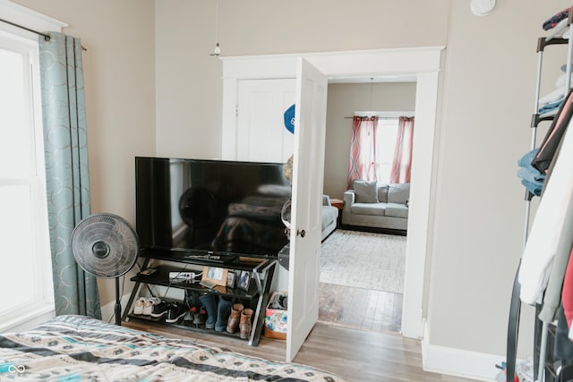 bedroom with wood finished floors