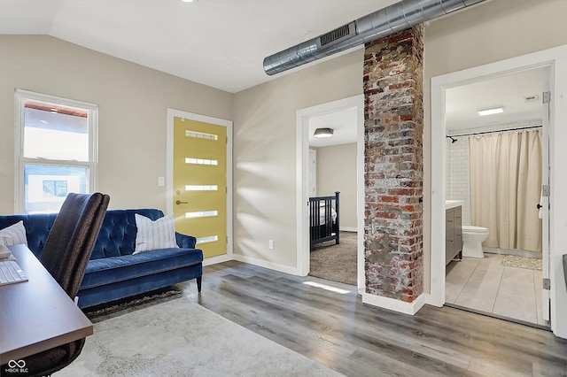 934 E Minnesota St, Indianapolis, IN 46203 - office featuring baseboards, wood finished floors, and vaulted ceiling
