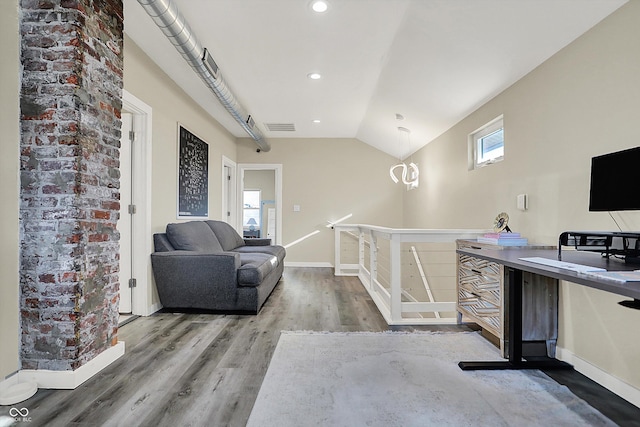934 E Minnesota St, Indianapolis, IN 46203 - interior space featuring wood finished floors, lofted ceiling, baseboards, visible vents, and recessed lighting