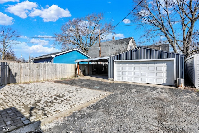 934 E Minnesota St, Indianapolis, IN 46203 - garage with driveway and fence