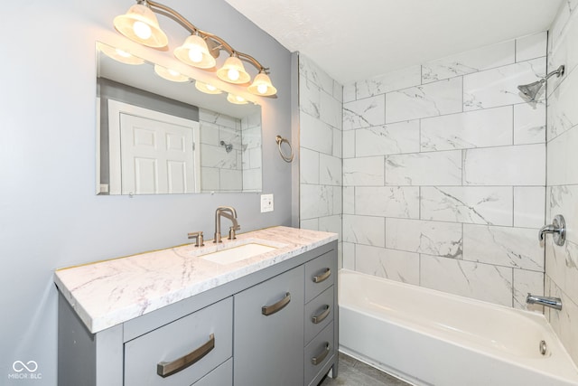 bathroom with shower / bathtub combination and vanity