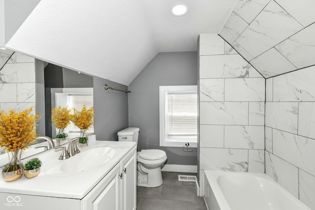 1653 S Delaware St, Indianapolis, IN 46225 - bathroom featuring vanity, vaulted ceiling, toilet, and baseboards