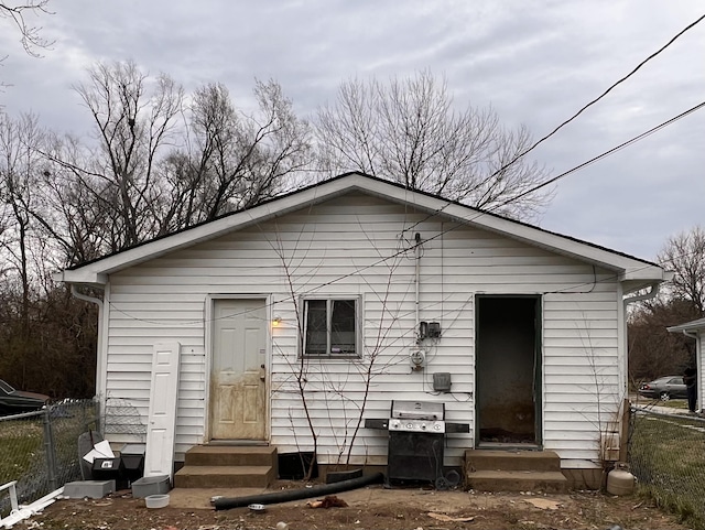 2194 N Riley Ave, Indianapolis, IN 46218 - back of property with fence and entry steps