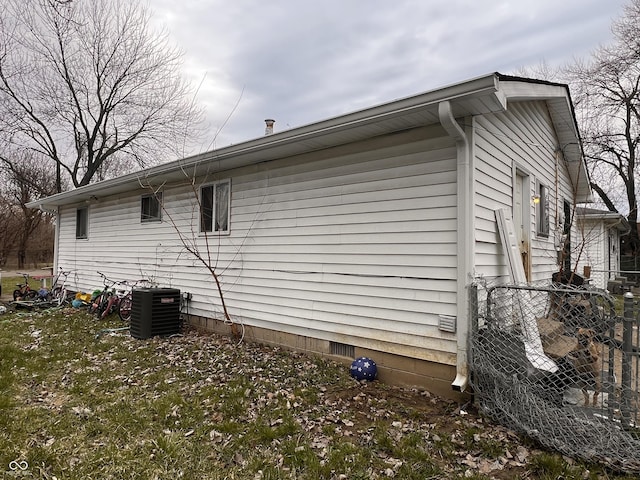 2194 N Riley Ave, Indianapolis, IN 46218 - view of home's exterior with central AC unit and fence