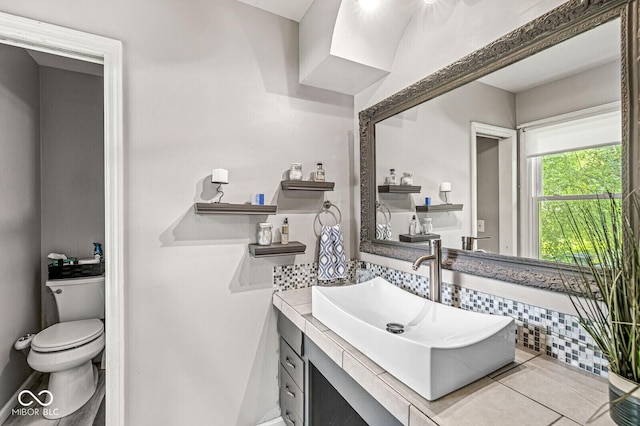 7138 Avalon Trail Ct, Indianapolis, IN 46250 - half bath with vanity and tile patterned floors