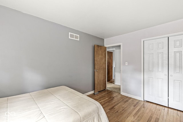 7138 Avalon Trail Ct, Indianapolis, IN 46250 - bedroom with wood finished floors and a closet
