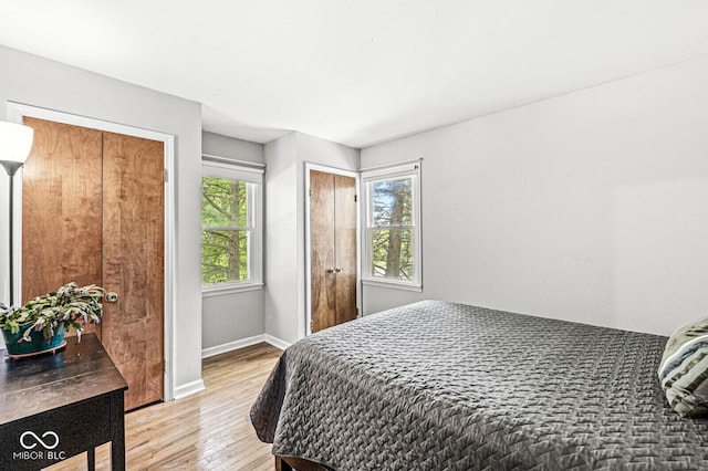 7138 Avalon Trail Ct, Indianapolis, IN 46250 - bedroom featuring light wood-style floors and baseboards
