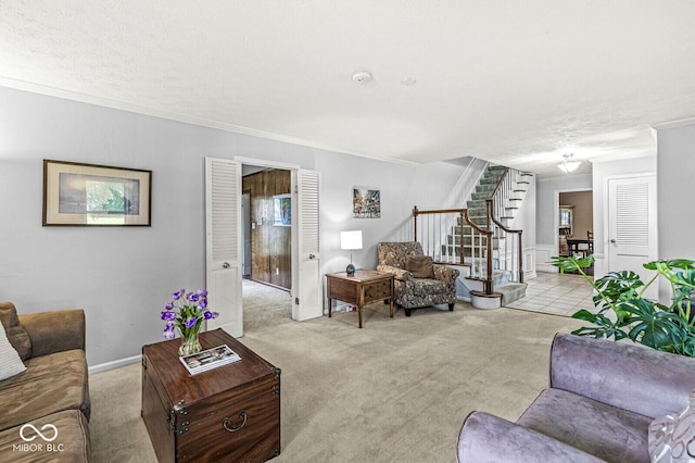 7138 Avalon Trail Ct, Indianapolis, IN 46250 - living room featuring stairs, crown molding, and light carpet