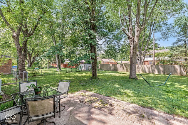 7138 Avalon Trail Ct, Indianapolis, IN 46250 - view of yard with a patio area and outdoor dining space