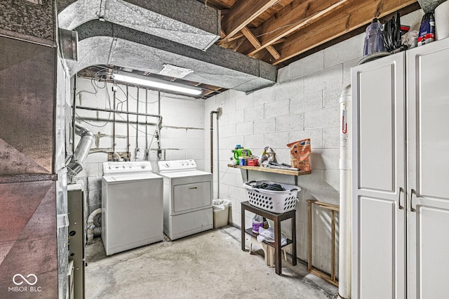 7138 Avalon Trail Ct, Indianapolis, IN 46250 - laundry area featuring separate washer and dryer and concrete block wall