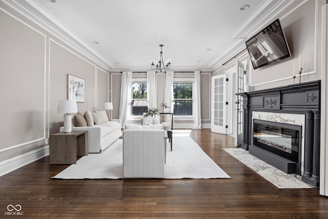 3447 Washington Blvd, Indianapolis, IN 46205 - living area featuring ornamental molding, a chandelier, dark wood-type flooring, a premium fireplace, and baseboards