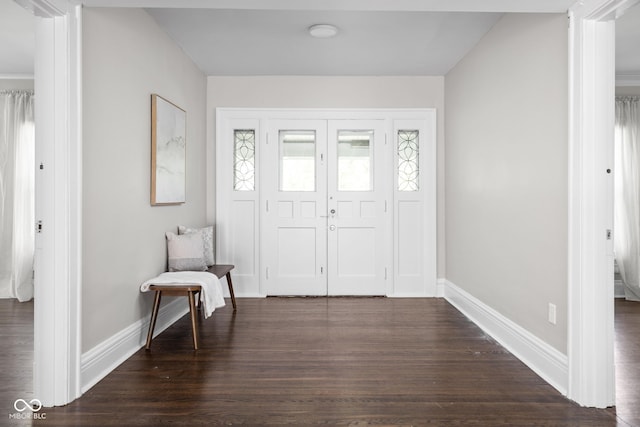 3447 Washington Blvd, Indianapolis, IN 46205 - entryway with baseboards and dark wood-style flooring