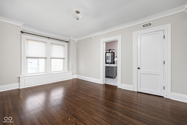 3447 Washington Blvd, Indianapolis, IN 46205 - unfurnished room featuring wood finished floors, ornamental molding, and baseboards
