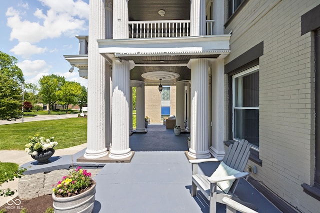 3447 Washington Blvd, Indianapolis, IN 46205 - view of patio / terrace featuring covered porch and a balcony