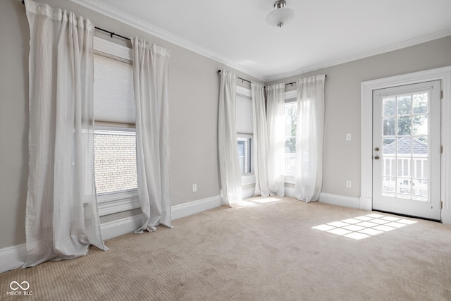 3447 Washington Blvd, Indianapolis, IN 46205 - carpeted empty room featuring crown molding and baseboards