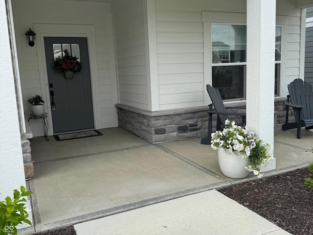 2460 Collins Dr, Westfield, IN 46074 - entrance to property with a porch and stone siding