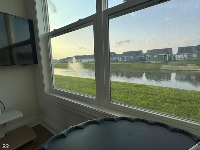 2460 Collins Dr, Westfield, IN 46074 - detailed view of a large body of water, baseboards, and a residential view