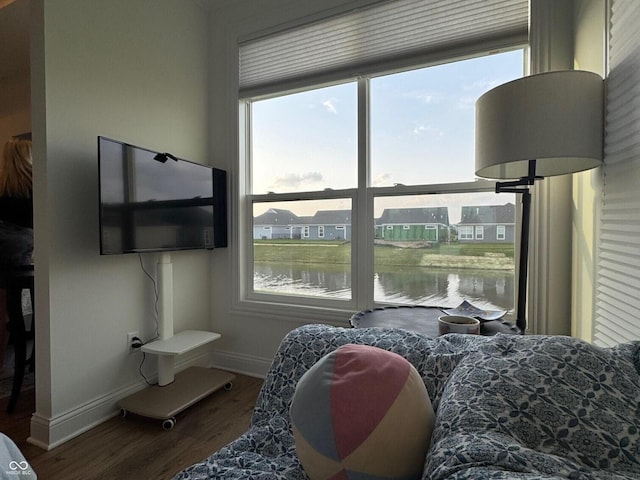 2460 Collins Dr, Westfield, IN 46074 - bedroom featuring multiple windows, baseboards, and wood finished floors