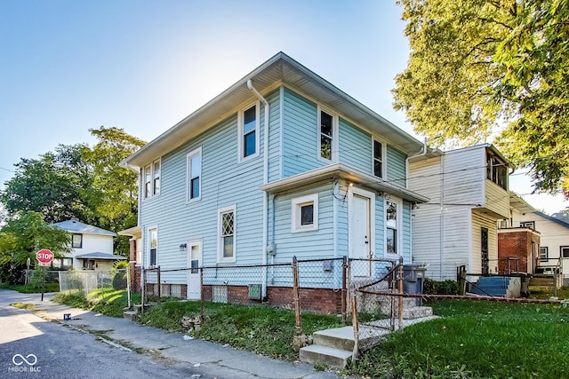 view of front of property with a fenced front yard