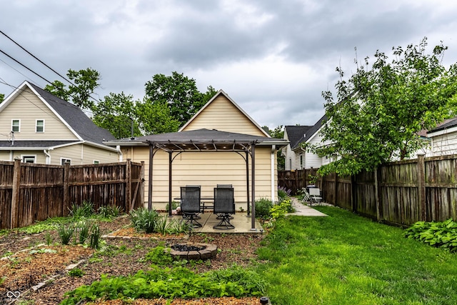 902 Villa Ave, Indianapolis, IN 46203 - rear view of house with a gazebo, a patio area, and an outdoor fire pit