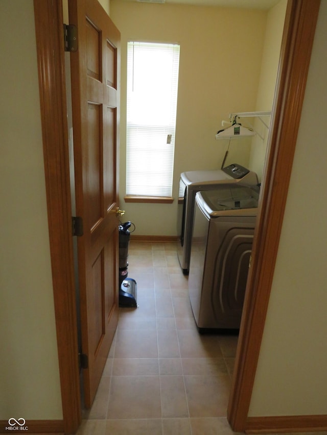 8358 Balmoral Dr, Avon, IN 46123 - laundry area with separate washer and dryer and light tile patterned floors