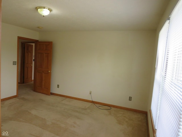 8358 Balmoral Dr, Avon, IN 46123 - unfurnished room featuring light colored carpet and a smoke detector