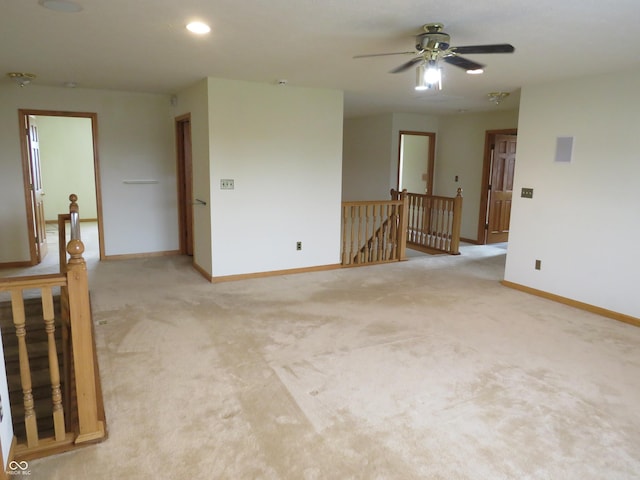8358 Balmoral Dr, Avon, IN 46123 - empty room with light carpet, a ceiling fan, and recessed lighting