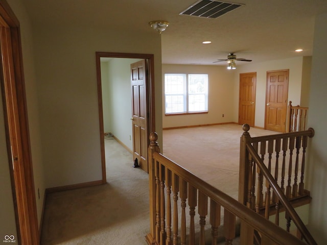 8358 Balmoral Dr, Avon, IN 46123 - hall featuring an upstairs landing, light colored carpet, and recessed lighting