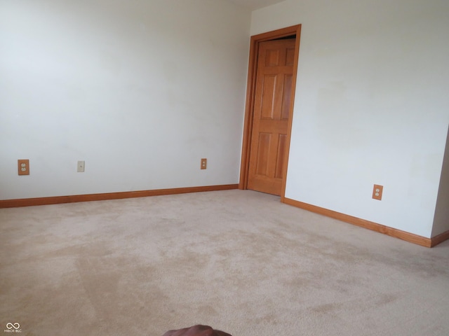 8358 Balmoral Dr, Avon, IN 46123 - unfurnished room with baseboards and light colored carpet