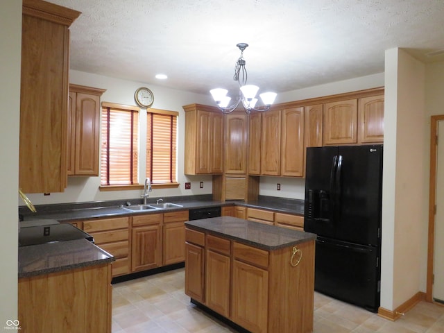 8358 Balmoral Dr, Avon, IN 46123 - kitchen with black appliances, a chandelier, pendant lighting, a kitchen island, and dark stone countertops