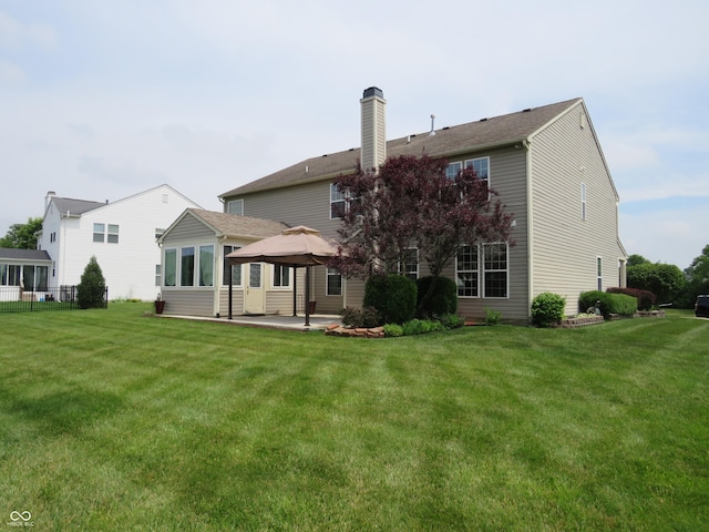 8358 Balmoral Dr, Avon, IN 46123 - rear view of property with a gazebo, a chimney, and a patio