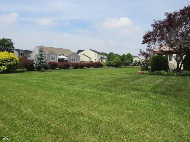 8358 Balmoral Dr, Avon, IN 46123 - view of grassy yard featuring a residential view