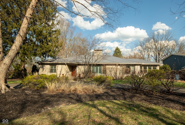 7525 N Meridian St, Indianapolis, IN 46260 - view of front of property featuring a chimney