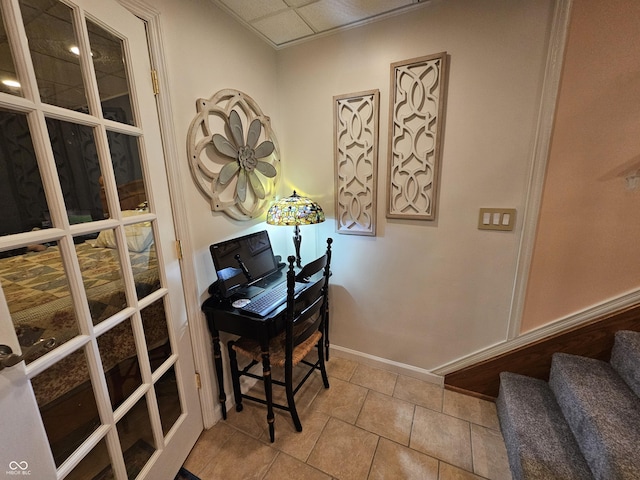 tiled office featuring baseboards
