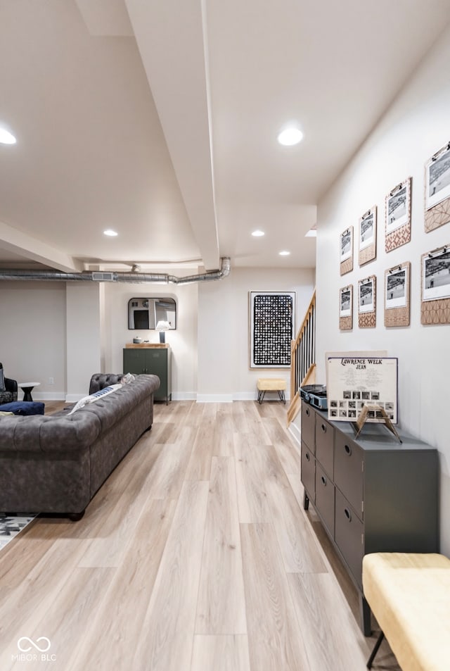 1802 Bellefontaine St, Indianapolis, IN 46202 - living area with light wood-style floors, recessed lighting, stairway, and baseboards
