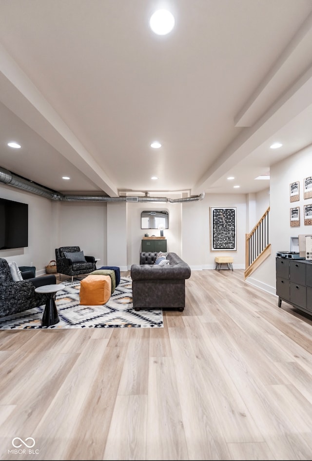 1802 Bellefontaine St, Indianapolis, IN 46202 - living area featuring stairway, wood finished floors, recessed lighting, and baseboards