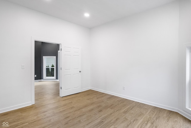 555 N Hamilton Ave, Indianapolis, IN 46201 - empty room with light wood-style flooring, baseboards, and recessed lighting