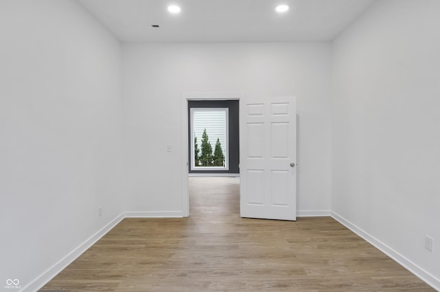 555 N Hamilton Ave, Indianapolis, IN 46201 - spare room with baseboards, light wood finished floors, and recessed lighting